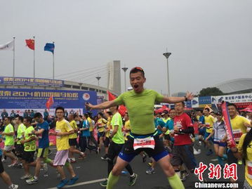 2014杭州國際馬拉松3萬人開跑 35個國家地區參賽